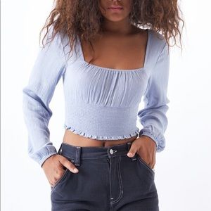 La hearts blue smocked long sleeve top